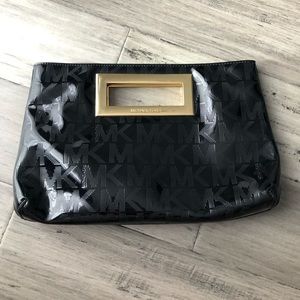 MK clutch black with gold accents